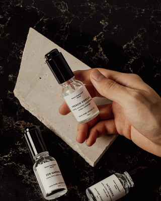 person holding Fragrance Oil