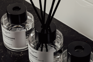 Reed Diffusers on sleek black marble counter