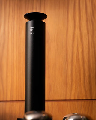 kirri beacon diffuser against a timber wall