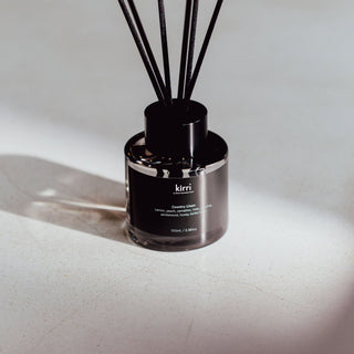kirri country linen reed diffuser catching afternoon sunlight