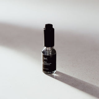 kirri dream micro oil on a pale stone bench in sunlight